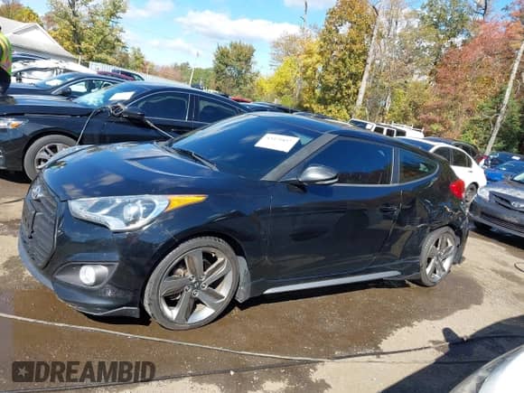 2013 Hyundai Veloster Turbo с VIN KMHTC6AE8DU156928, выставлен на аукционе IAAI как лот 43471857 с пробегом 103 265 миль миль и . История ставок и продаж доступна на DreamBid. Изображение 14.