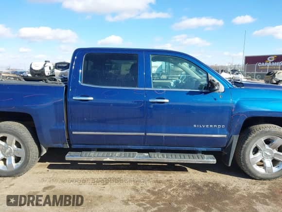 2017 Chevrolet Silverado 1500 LTZ with VIN 3GCUKSEC4HG371972, listed as a IAAI auction lot 41696294 with 123,297 mi miles and . Bid and sale history available at DreamBid. Image 14.