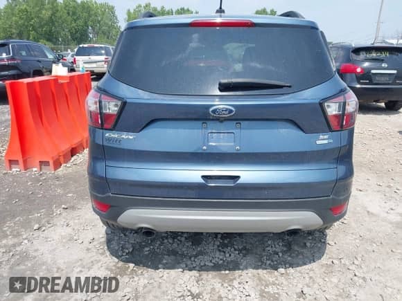 2018 Ford Escape SE с VIN 1FMCU9GD2JUB15834, выставлен на аукционе IAAI как лот 42885507 с пробегом 189 098 миль миль и . История ставок и продаж доступна на DreamBid. Изображение 16.