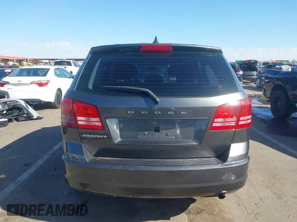 2014 Dodge Journey SE с VIN 3C4PDCAB5ET182518, выставлен на аукционе IAAI как лот 43214035 с пробегом 125 020 миль миль и . История ставок и продаж доступна на DreamBid. Изображение 17.