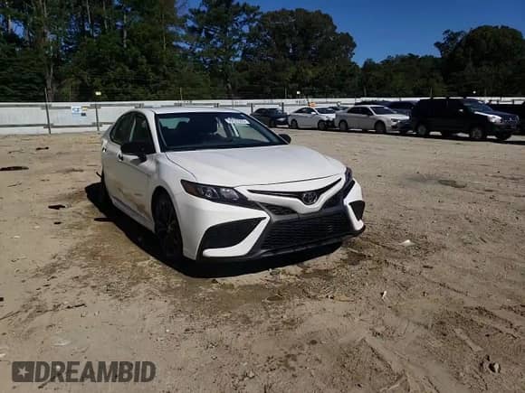 2022 Toyota Camry SE z VIN 4T1G11AK5NU030429, wystawiony jako Copart lot #70127655 z przebiegiem 50 191 mil mil oraz Szkoda całkowita • Salvage title. Historia ofert i sprzedaży dostępna na DreamBid. Obrazek 13.