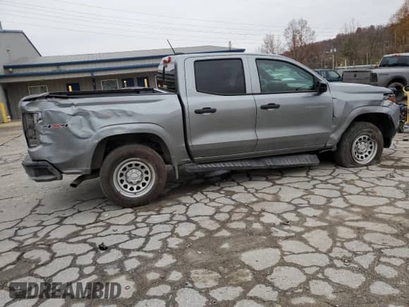 2023 Chevrolet Colorado 4WD Work Truck with VIN 1GCPTBEK1P1255921, listed as a Copart auction lot 79554184 with 8,452 mi miles and Salvage title. Bid and sale history available at DreamBid. Image 3.