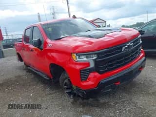 2024 Chevrolet Silverado 1500 LT Trail Boss z VIN 3GCUDFED3RG153209, wystawiony jako IAAI lot #42535836 z przebiegiem 22 701 mil mil oraz . Historia ofert i sprzedaży dostępna na DreamBid. Obrazek 1.