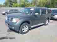 2005 Nissan Pathfinder SE with VIN 5N1AR18W55C778904, listed as a IAAI auction lot 43316572 with 193,515 mi miles and . Bid and sale history available at DreamBid. Image 2.