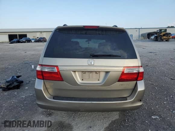 2005 Honda Odyssey EX z VIN 5FNRL384X5B400342, wystawiony jako Copart lot #80887225 z przebiegiem 214 575 mil mil oraz Szkoda całkowita • Salvage title. Historia ofert i sprzedaży dostępna na DreamBid. Obrazek 6.