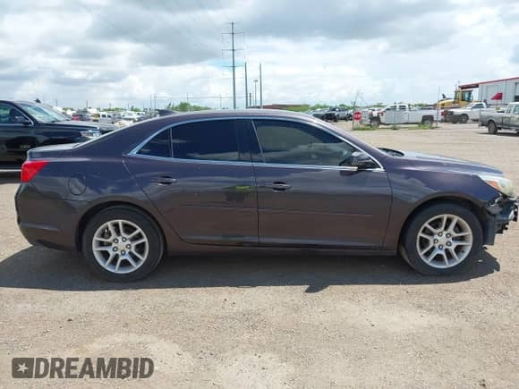 2015 Chevrolet Malibu LT z VIN 1G11C5SL1FF203669, wystawiony jako IAAI lot #43173679 z przebiegiem 172 863 mil mil oraz . Historia ofert i sprzedaży dostępna na DreamBid. Obrazek 14.
