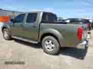 2005 Nissan Frontier SE with VIN 1N6AD07U15C402856, listed as a Copart auction lot 65883815 with 130,400 mi miles and Salvage title. Bid and sale history available at DreamBid. Image 2.