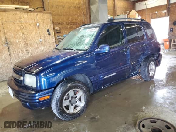 2003 Chevrolet Tracker LT with VIN 2CNBE634836935351, listed as a Copart auction lot 60396195 with 199,346 mi miles and Salvage title. Bid and sale history available at DreamBid. Image 1.
