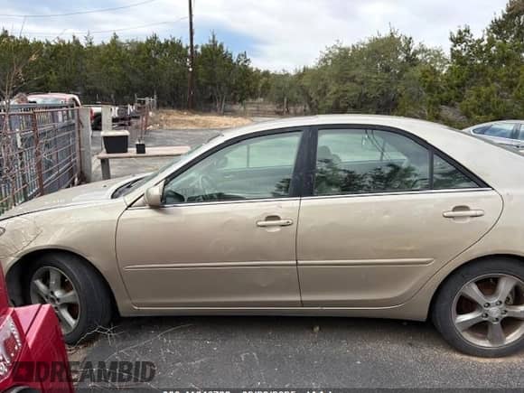 2005 Toyota Camry SE with VIN 4T1BA32K05U074598, listed as a IAAI auction lot 41646733 with 119,170 mi miles and . Bid and sale history available at DreamBid. Image 12.