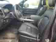 2023 Ram 1500 Rebel with VIN 1C6SRFLT1PN668899, listed as a Copart auction lot 66134035 with 12,995 mi miles and Clean title. Bid and sale history available at DreamBid. Image 7.