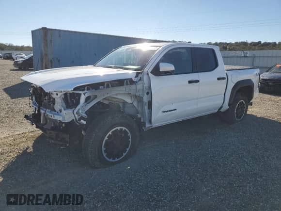 2024 Toyota Tacoma TRD Off Road with VIN 3TMLB5JN8RM013149, listed as a Copart auction lot 82496085 with 21,215 mi miles and Salvage title. Bid and sale history available at DreamBid. Image 1.