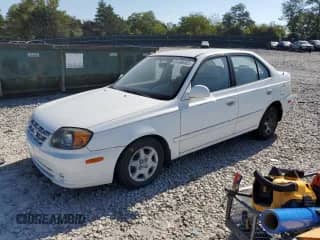 2005 Hyundai Accent GLS z VIN KMHCG45C55U616484, wystawiony jako Copart lot #81498465 z przebiegiem 34 578 mil mil oraz Szkoda całkowita • Salvage title. Historia ofert i sprzedaży dostępna na DreamBid. Obrazek 1.