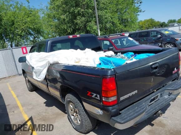 2004 GMC Sierra 1500 SLE with VIN 1GTEK19T44E212539, listed as a IAAI auction lot 42518037 with 241,436 mi miles and . Bid and sale history available at DreamBid. Image 3.