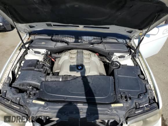 2005 BMW 7 Series 745i z VIN WBAGL63545DP76015, wystawiony jako Copart lot #58576814 z przebiegiem Nie podano mil oraz Szkoda całkowita • Salvage title. Historia ofert i sprzedaży dostępna na DreamBid. Obrazek 11.