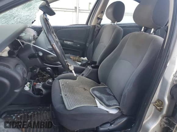 2001 Dodge Neon Highline z VIN 1B3ES46CX1D124958, wystawiony jako Copart lot #75360444 z przebiegiem Nie podano mil oraz Szkoda całkowita • Salvage title. Historia ofert i sprzedaży dostępna na DreamBid. Obrazek 7.