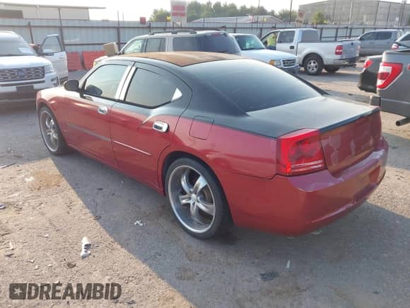 2007 Dodge Charger with VIN 2B3KA43R67H622147, listed as a IAAI auction lot 43229532 with 184,611 mi miles and . Bid and sale history available at DreamBid. Image 3.