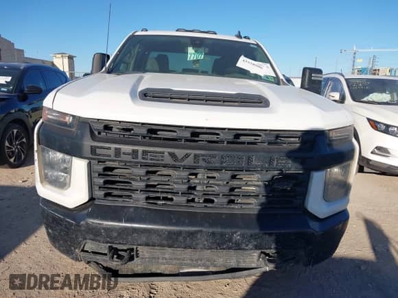 2022 Chevrolet Silverado 2500HD Work Truck z VIN 1GC1YLE76NF233843, wystawiony jako IAAI lot #43558906 z przebiegiem 156 844 mil mil oraz . Historia ofert i sprzedaży dostępna na DreamBid. Obrazek 12.