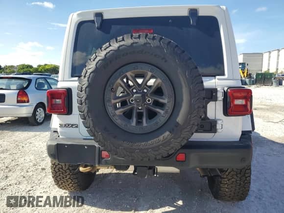 2022 Jeep Wrangler Unlimited Rubicon 392 с VIN 1C4JJXSJ8NW102697, выставлен на аукционе Copart как лот 67171155 с пробегом 34 094 миль миль и Списание • Salvage title. История ставок и продаж доступна на DreamBid. Изображение 6.