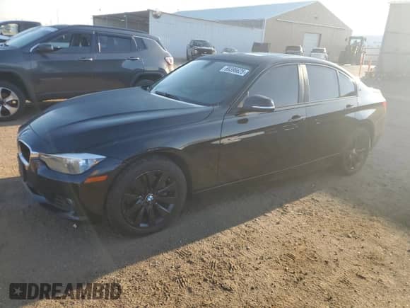 2015 BMW 3 Series 328i xDrive with VIN WBA3B3C54FF545752, listed as a Copart auction lot 69396625 with 93,400 mi miles and Salvage title. Bid and sale history available at DreamBid. Image 1.