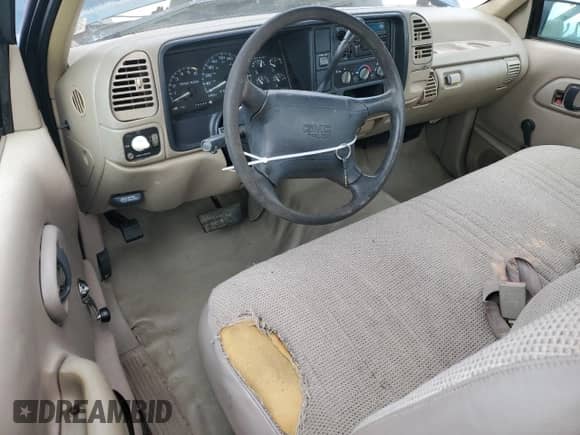 1996 GMC Sierra 1500 с VIN 1GTEC14W4TZ530991, выставлен на аукционе Copart как лот 43783425 с пробегом 243 467 миль миль и Списание • Salvage title. История ставок и продаж доступна на DreamBid. Изображение 8.