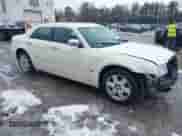 2005 Chrysler 300 300C AWD with VIN 2C3AK63H95H639570, listed as a IAAI auction lot 41690504 with 105,724 mi miles and . Bid and sale history available at DreamBid. Image 1.