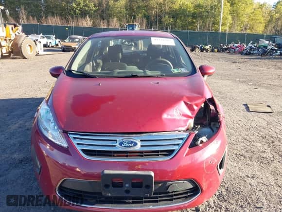 2011 Ford Fiesta SE z VIN 3FADP4BJ4BM105463, wystawiony jako IAAI lot #43338367 z przebiegiem 75 995 mil mil oraz . Historia ofert i sprzedaży dostępna na DreamBid. Obrazek 12.