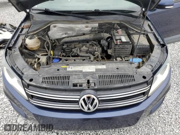 2015 Volkswagen Tiguan S с VIN WVGAV7AX2FW521877, выставлен на аукционе Copart как лот 53238565 с пробегом 105 543 миль миль и На запчасти • Non repairable. История ставок и продаж доступна на DreamBid. Изображение 12.
