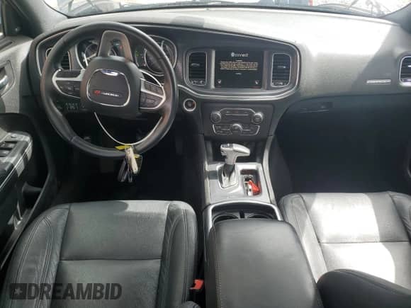 2015 Dodge Charger SXT with VIN 2C3CDXJG6FH863853, listed as a Copart auction lot 72098675 with 117,178 mi miles and Salvage title. Bid and sale history available at DreamBid. Image 8.