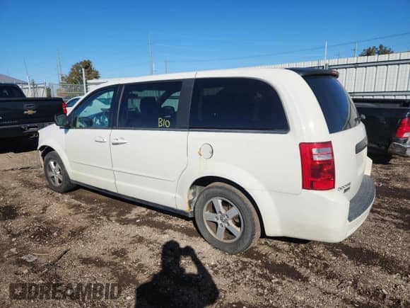 2010 Dodge Grand Caravan SE z VIN 2D4RN4DE4AR343216, wystawiony jako Copart lot #85478925 z przebiegiem 161 181 mil mil oraz Czysty tytuł • Clean title. Historia ofert i sprzedaży dostępna na DreamBid. Obrazek 2.