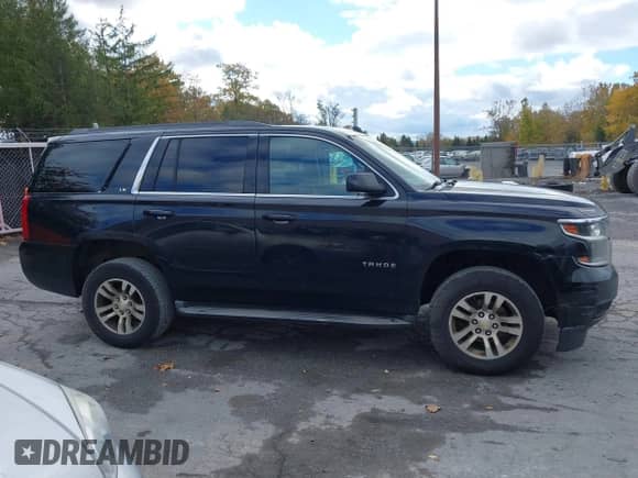 2015 Chevrolet Tahoe LS z VIN 1GNSKAKC6FR578745, wystawiony jako IAAI lot #43481431 z przebiegiem 452 330 mil mil oraz . Historia ofert i sprzedaży dostępna na DreamBid. Obrazek 13.