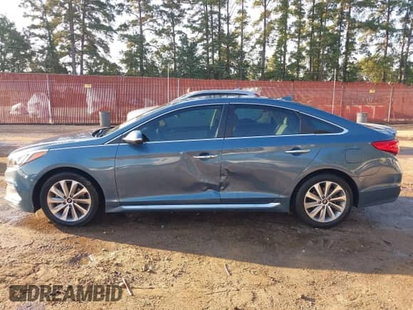 2015 Hyundai Sonata Sport z VIN 5NPE34AF3FH142376, wystawiony jako IAAI lot #43357612 z przebiegiem 121 002 mil mil oraz . Historia ofert i sprzedaży dostępna na DreamBid. Obrazek 6.