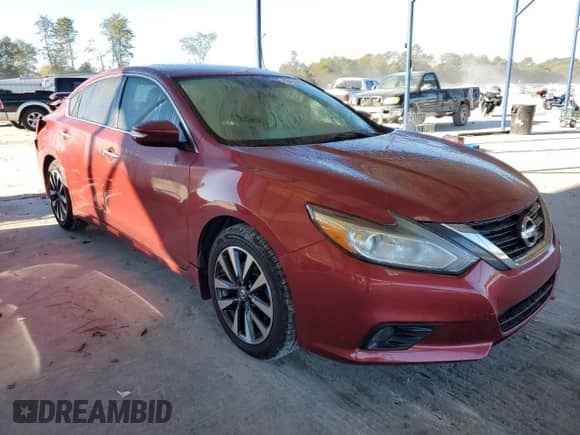 2016 Nissan Altima SR with VIN 1N4AL3AP8GC197670, listed as a Copart auction lot 82434905 with 70,672 mi miles and Salvage title. Bid and sale history available at DreamBid. Image 4.