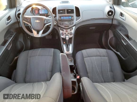 2012 Chevrolet Sonic LT z VIN 1G1JC6SH5C4140536, wystawiony jako Copart lot #85145585 z przebiegiem 93 734 mil mil oraz Szkoda całkowita • Salvage title. Historia ofert i sprzedaży dostępna na DreamBid. Obrazek 8.