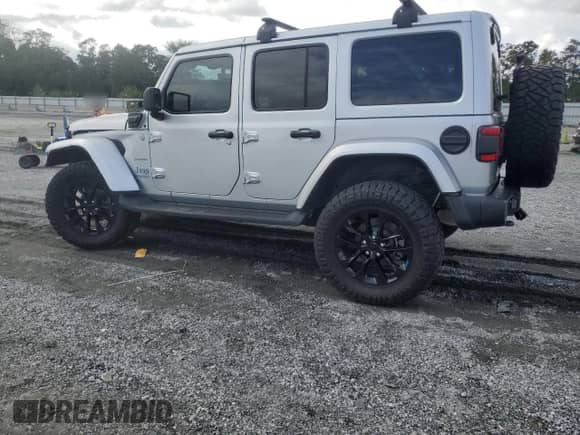 2022 Jeep Wrangler Unlimited Sahara with VIN 1C4JJXP69NW279828, listed as a Copart auction lot 84058525 with 8,315 mi miles and Salvage title. Bid and sale history available at DreamBid. Image 2.