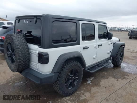 2021 Jeep Wrangler Unlimited Sport S with VIN 1C4HJXDG8MW509322, listed as a IAAI auction lot 42110123 with 39,955 mi miles and . Bid and sale history available at DreamBid. Image 4.