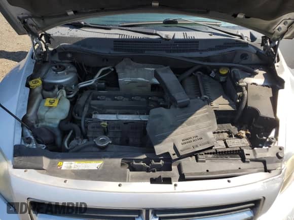 2010 Dodge Caliber SXT with VIN 1B3CB4HA5AD530259, listed as a Copart auction lot 70313555 with 184,173 mi miles and Salvage title. Bid and sale history available at DreamBid. Image 11.