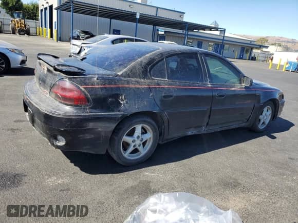 2000 Pontiac Grand Am GT z VIN 1G2NW52E3YC553038, wystawiony jako Copart lot #67668845 z przebiegiem 215 693 mil mil oraz Czysty tytuł • Clean title. Historia ofert i sprzedaży dostępna na DreamBid. Obrazek 3.