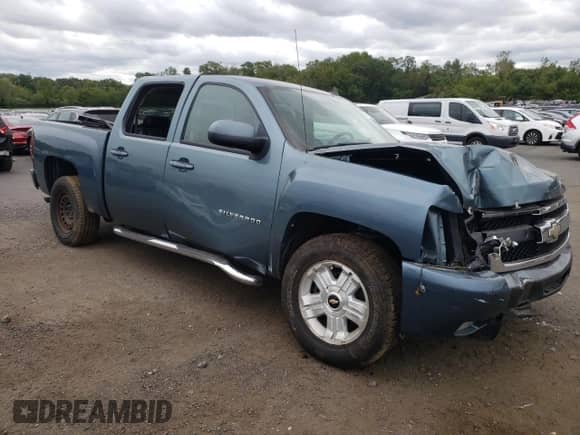 2010 Chevrolet Silverado 1500 LTZ with VIN 3GCRKTE38AG102780, listed as a Copart auction lot 69476475 with 126,223 mi miles and Salvage title. Bid and sale history available at DreamBid. Image 4.