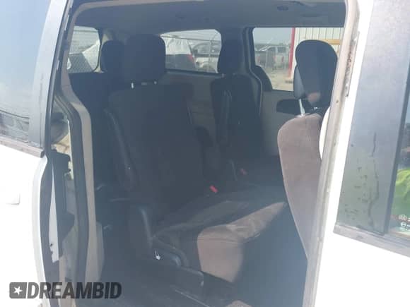 2014 Dodge Grand Caravan SE with VIN 2C4RDGBG1ER114603, listed as a IAAI auction lot 43201305 with 206,724 mi miles and . Bid and sale history available at DreamBid. Image 8.