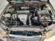 2000 Toyota Camry LE z VIN JT2BG22K0Y0440027, wystawiony jako Copart lot #82117435 z przebiegiem 126 191 mil mil oraz Szkoda całkowita • Salvage title. Historia ofert i sprzedaży dostępna na DreamBid. Obrazek 11.