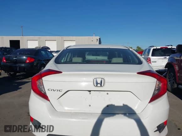 2016 Honda Civic LX z VIN 19XFC2F59GE242934, wystawiony jako IAAI lot #43139806 z przebiegiem 95 282 mil mil oraz . Historia ofert i sprzedaży dostępna na DreamBid. Obrazek 17.