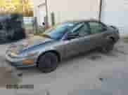 2000 Saturn SL with VIN 1G8ZJ5274YZ256204, listed as a Copart auction lot 79502124 with 190,120 mi miles and Salvage title. Bid and sale history available at DreamBid. Image 1.