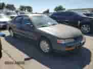 1996 Honda Accord LX z VIN 1HGCD5633TA102845, wystawiony jako Copart lot #71611085 z przebiegiem 139 042 mil mil oraz Szkoda całkowita • Salvage title. Historia ofert i sprzedaży dostępna na DreamBid. Obrazek 4.
