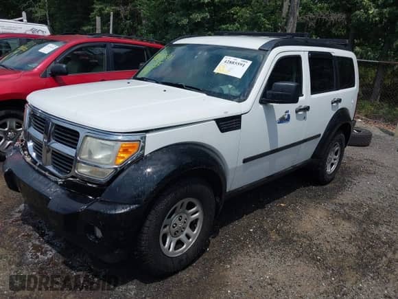2011 Dodge Nitro SE with VIN 1D4PT2GK6BW590135, listed as a IAAI auction lot 42885591 with 192,411 mi miles and . Bid and sale history available at DreamBid. Image 17.