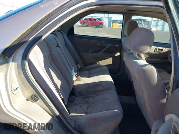 1998 Toyota Camry LE with VIN JT2BG22K3W0151088, listed as a IAAI auction lot 41429977 with 435,394 mi miles and . Bid and sale history available at DreamBid. Image 8.