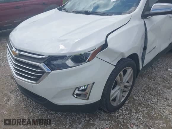 2018 Chevrolet Equinox Premier with VIN 2GNAXNEXXJ6338654, listed as a IAAI auction lot 43047391 with 97,169 mi miles and . Bid and sale history available at DreamBid. Image 6.