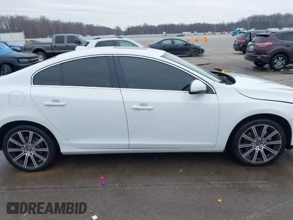 2015 Volvo S60 T6 Drive-E with VIN YV149MFK1F2366869, listed as a IAAI auction lot 41452923 with 98,005 mi miles and . Bid and sale history available at DreamBid. Image 13.