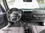 2004 Jeep Wrangler X z VIN 1J4FA39S64P753911, wystawiony jako Copart lot #86479285 z przebiegiem 138 801 mil mil oraz Czysty tytuł • Clean title. Historia ofert i sprzedaży dostępna na DreamBid. Obrazek 9.