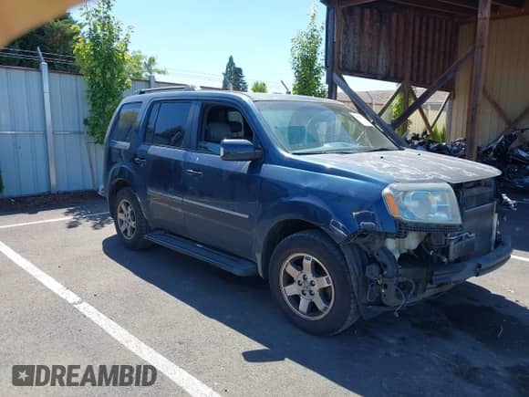 2010 Honda Pilot Touring с VIN 5FNYF4H90AB003639, выставлен на аукционе IAAI как лот 42935064 с пробегом 215 394 миль миль и . История ставок и продаж доступна на DreamBid. Изображение 1.