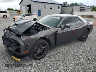 2021 Dodge Challenger GT with VIN 2C3CDZKG3MH611159, listed as a Copart auction lot 60062565 with 67,689 mi miles and Salvage title. Bid and sale history available at DreamBid. Image 1.